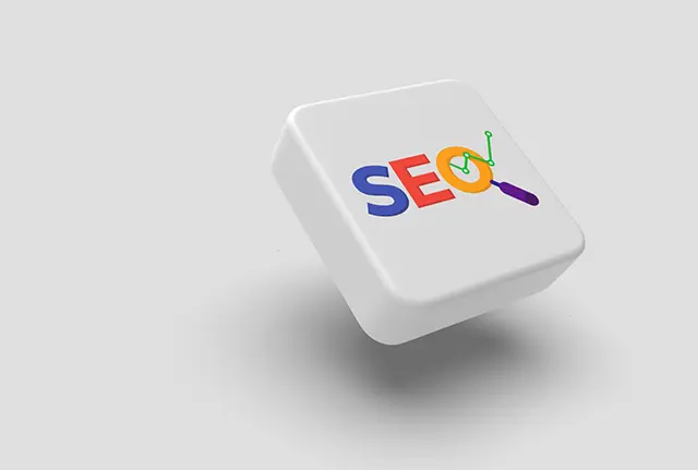 A picture of a white cube with SEO written on it